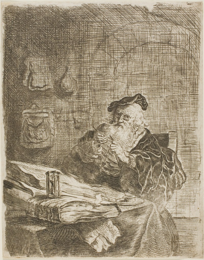 an etching on ivory paper of a bearded man in robes sharpening a quill in front of his writing desk piled with books.